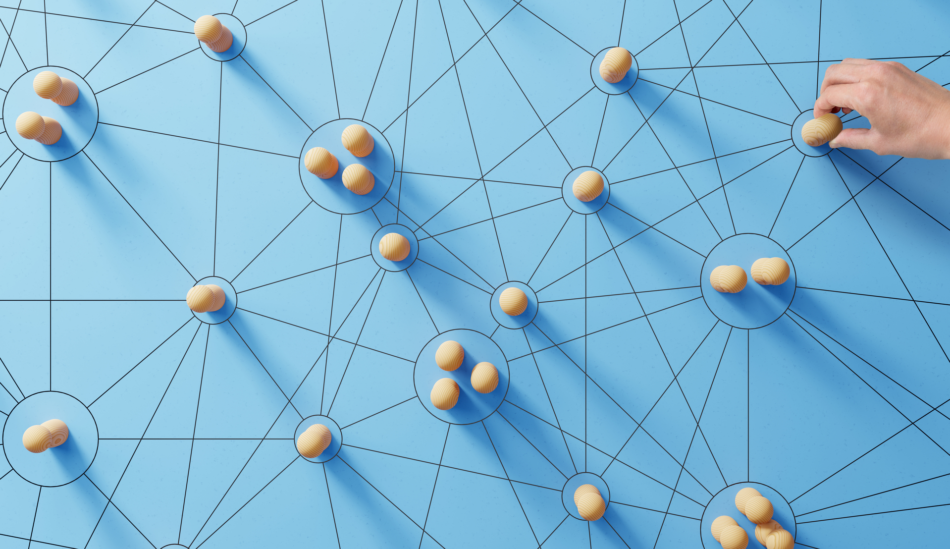 Social media networking. Network with members connected with each other. Group of people. Communication, teamwork, community, society. Abstract concept with wooden pieces on blue background. 2023/08/AdobeStock_507827625.jpeg 