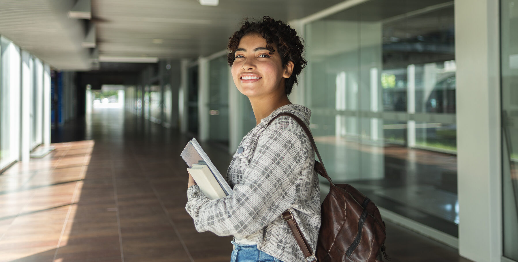 Portrait of a student in a campus-like location 2024/02/iStock-1433942937-e1708564878941.jpg 